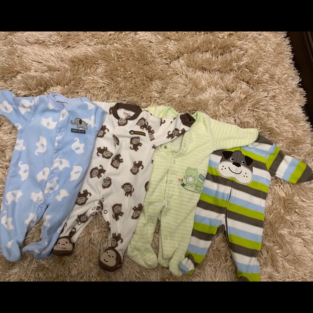 Lot of 4 new born one piece pajamas